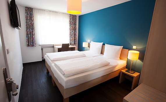 A double room at Centro Hotel Arkadia in Cologne
